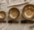 Small, medium, and large hand-hammered singing bowls for choosing the right size